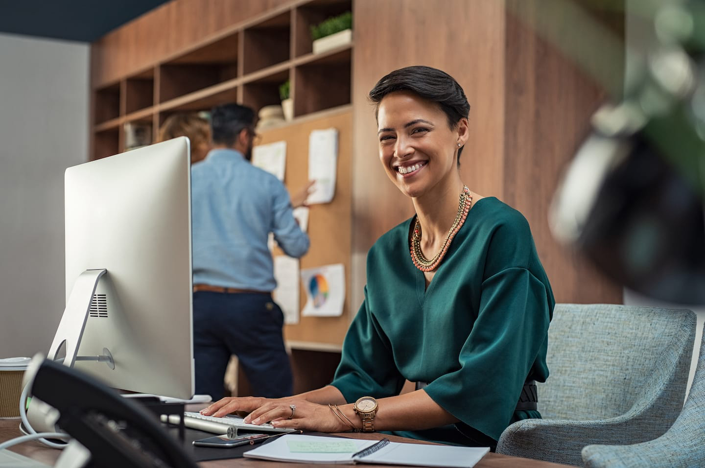 young-businesswoman-smiling-at-office-LGQRJY2